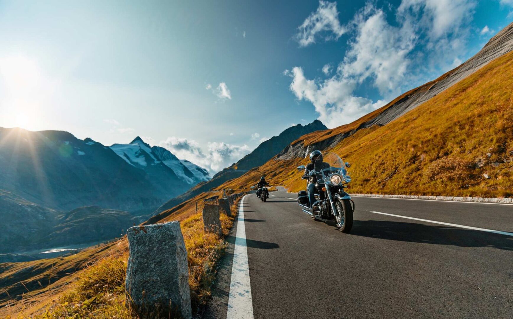 A beautiful view of the mountains with bikers